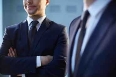 close-up-employee-with-crossed-arms_1098-3034